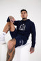 A man sit wore gym hoodie