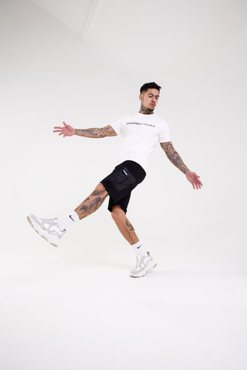 Best white shirt with black shorts 