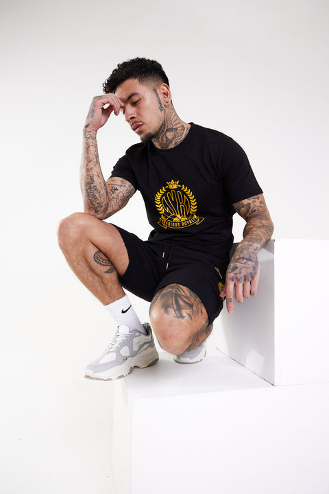 A man sit, wore Men's Muscle Fit T-Shirts